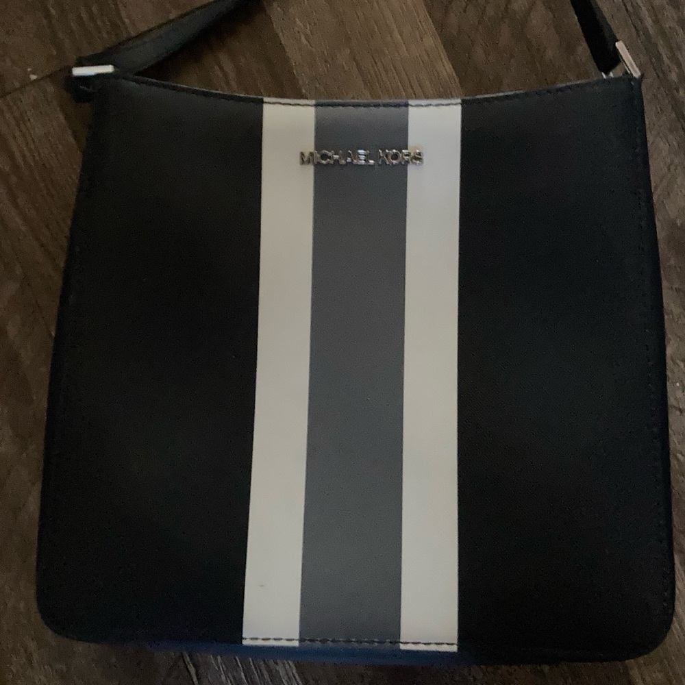 pretty black Michael Kors purse with gray and white stripes